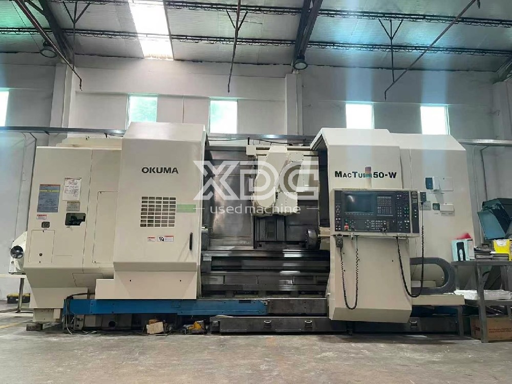 Used Okuma MAC TRUN 50-W turning and milling machine.